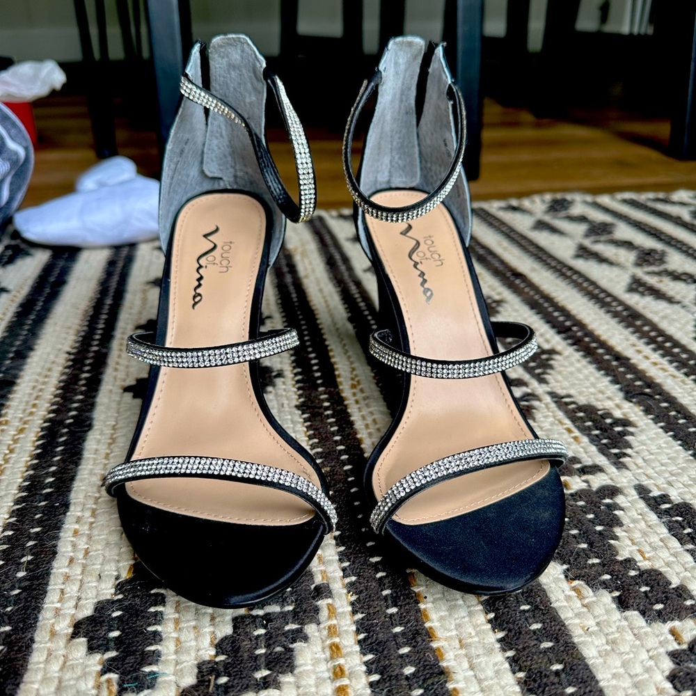 Black heels with rhinestones.